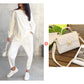 ⏰ Nu 63% KORTING 🔥 2-delige dames set – Top met asymmetrische zoom & casual broek
