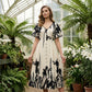 👗 Zachte Midi Jurk met Botanische Print & V-Hals – Licht, Elegant & Makkelijk te Dragen | Nu 58% KORTING | Maten S t/m 5XL! 🌸✨